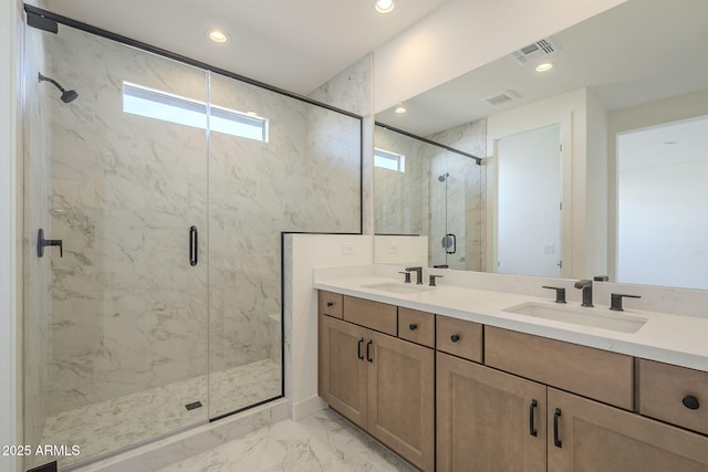 bathroom with vanity and walk in shower