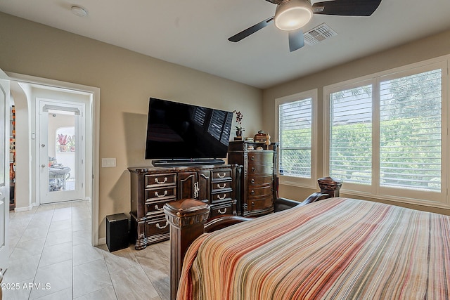 12738 W Brookhart Way, Peoria, AZ 85383 - bedroom with a ceiling fan and baseboards