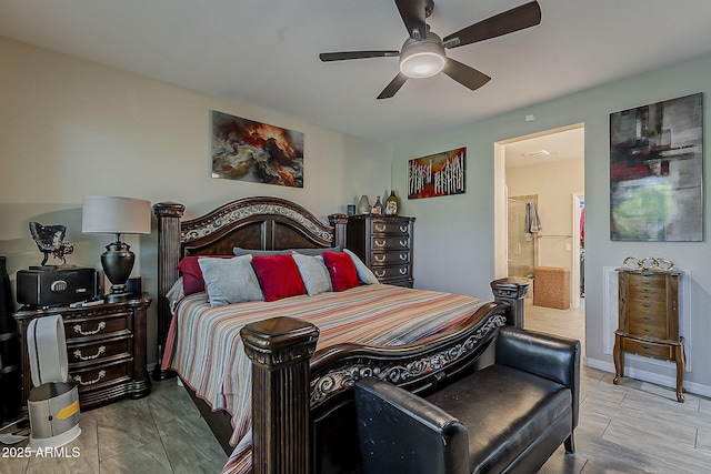 12738 W Brookhart Way, Peoria, AZ 85383 - bedroom with connected bathroom and a ceiling fan