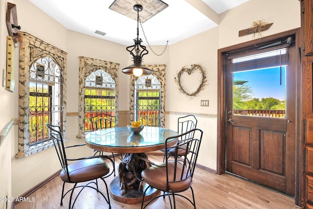 1338 W Mountain View Dr, Mesa, AZ 85201 - dining space featuring wainscoting and light wood-style floors