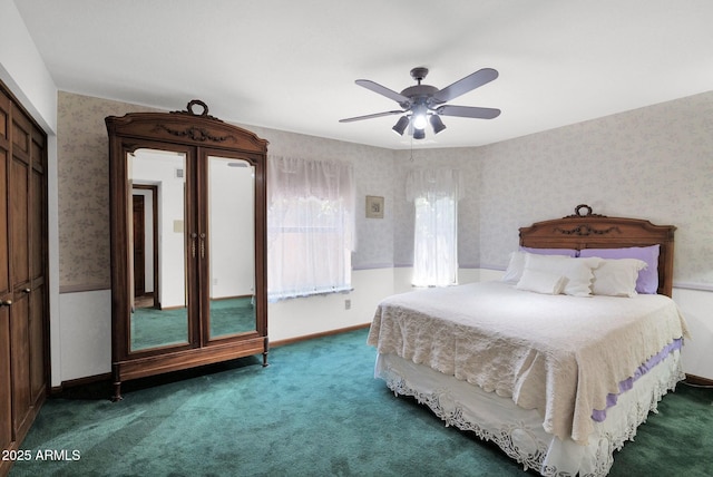 1338 W Mountain View Dr, Mesa, AZ 85201 - carpeted bedroom with wallpapered walls, a closet, ceiling fan, and baseboards
