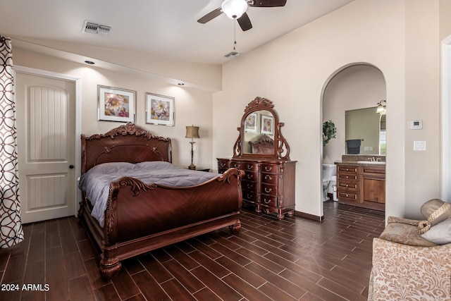 bedroom featuring sink and ceiling fan