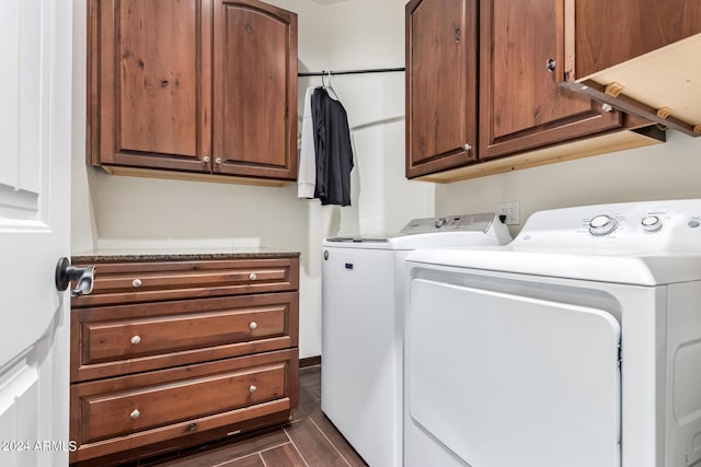 laundry area with cabinets and independent washer and dryer