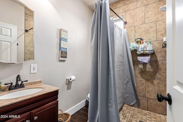 bathroom with vanity and walk in shower