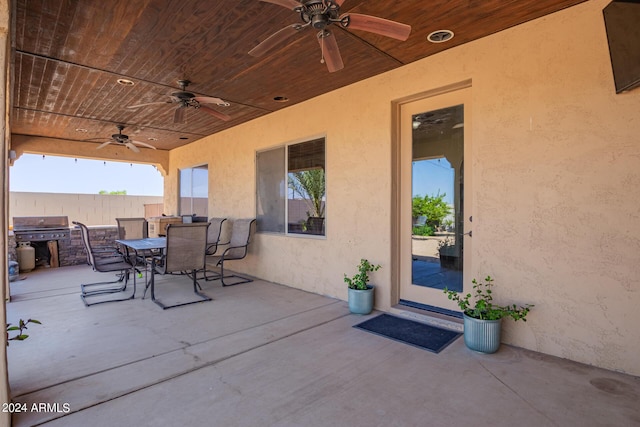 view of patio / terrace with area for grilling and ceiling fan