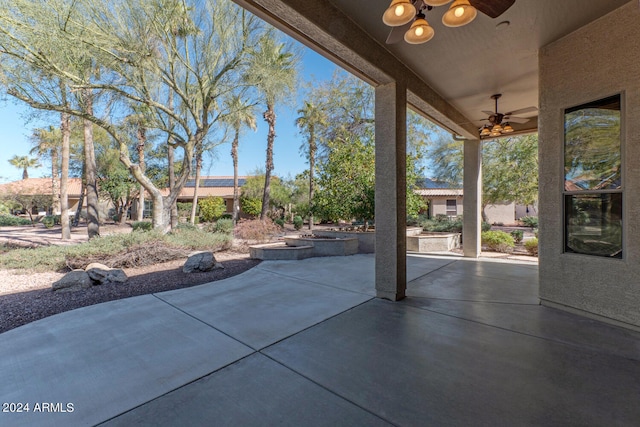 view of patio featuring ceiling fan