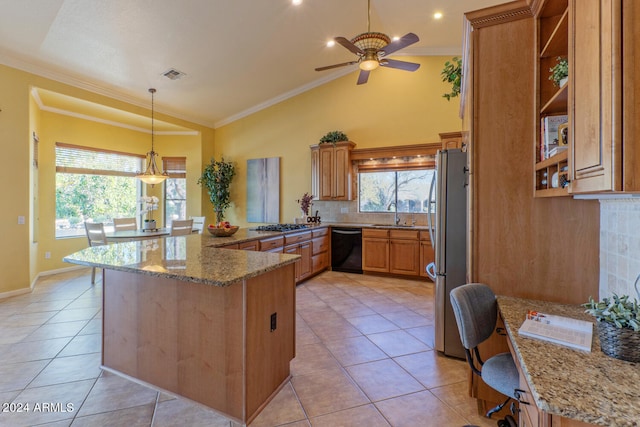 kitchen featuring light tile patterned floors, light stone countertops, ornamental molding, appliances with stainless steel finishes, and kitchen peninsula