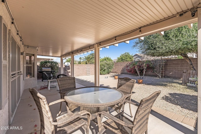 view of patio / terrace featuring a fenced backyard and outdoor dining area