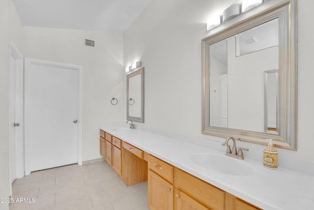 10304 E Plata Ave, Mesa, AZ 85212 - bathroom featuring double vanity and tile patterned flooring
