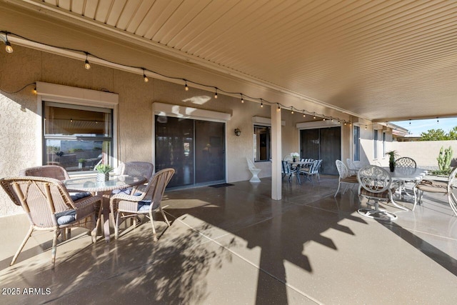 view of patio / terrace with fence and outdoor dining area