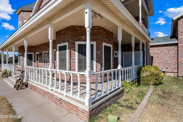 view of property exterior with covered porch