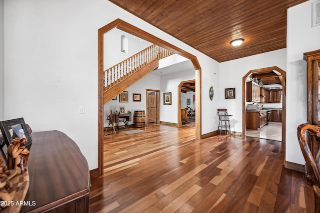 living room with hardwood / wood-style floors and wooden ceiling