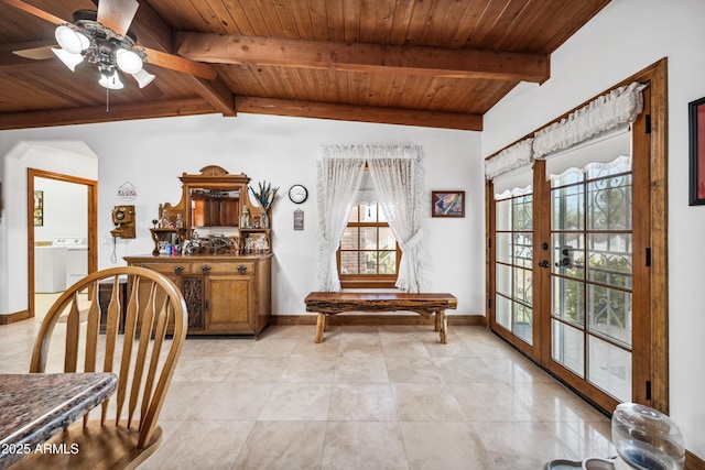 dining space featuring wooden ceiling, french doors, vaulted ceiling with beams, and ceiling fan