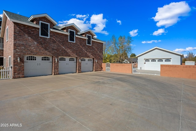 view of side of home with a garage