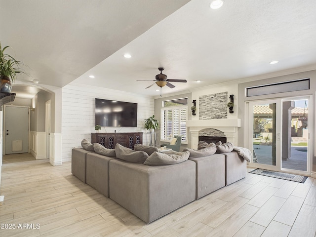 4530 W Misty Willow Ln, Glendale, AZ 85310 - living room with light hardwood / wood-style flooring, ceiling fan, and crown molding