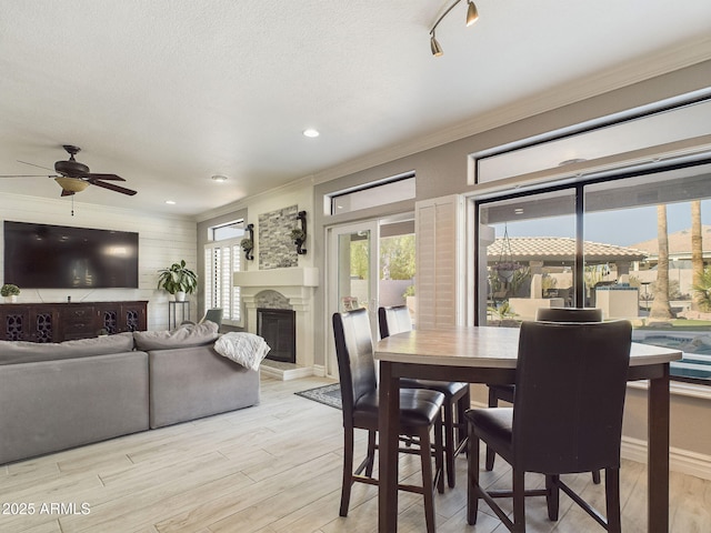 4530 W Misty Willow Ln, Glendale, AZ 85310 - dining space with ceiling fan, track lighting, and ornamental molding