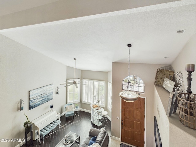4530 W Misty Willow Ln, Glendale, AZ 85310 - entryway with hardwood / wood-style floors, a textured ceiling, vaulted ceiling, and ceiling fan