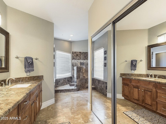 4530 W Misty Willow Ln, Glendale, AZ 85310 - bathroom featuring a tile shower and vanity