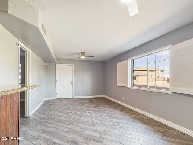 4530 W Misty Willow Ln, Glendale, AZ 85310 - unfurnished room featuring ceiling fan and light hardwood / wood-style flooring