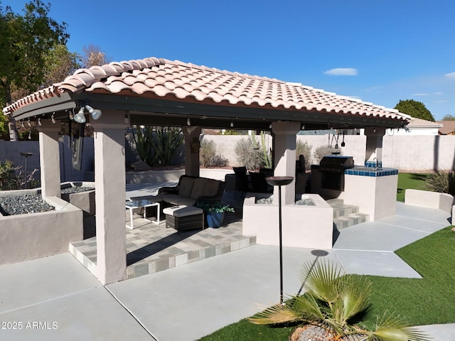 4530 W Misty Willow Ln, Glendale, AZ 85310 - view of patio / terrace with outdoor lounge area, a gazebo, an outdoor kitchen, and grilling area
