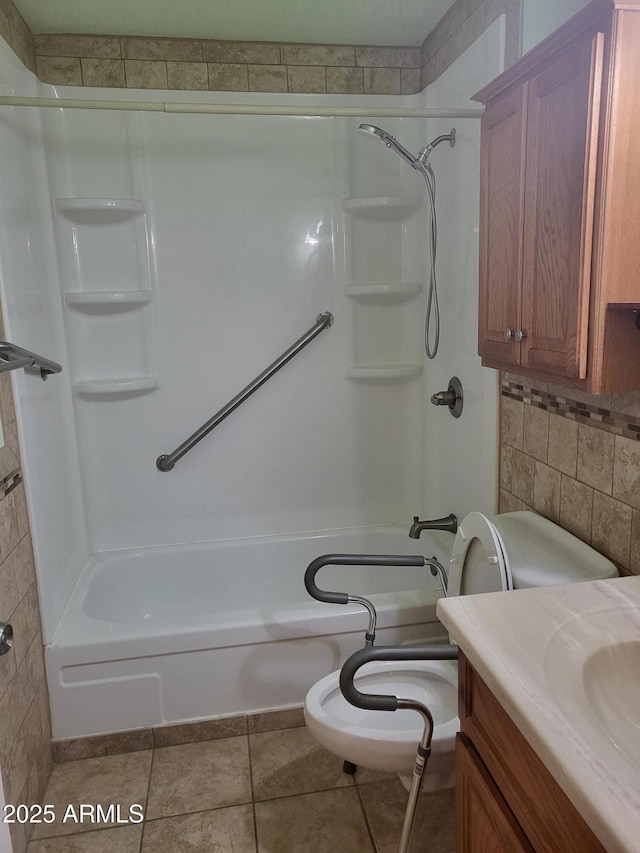 720 N 82nd St Unit E116, Scottsdale, AZ 85257 - full bath with tile patterned floors, shower / bath combination, vanity, and toilet