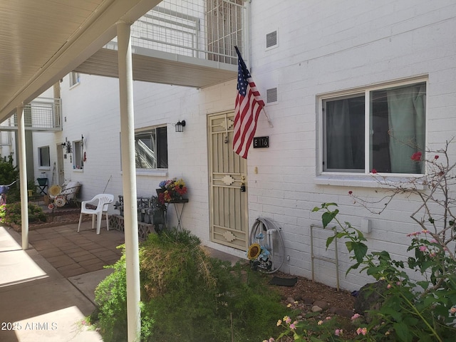 720 N 82nd St Unit E116, Scottsdale, AZ 85257 - doorway to property featuring a patio area