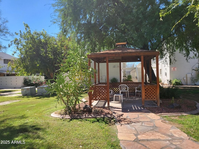 720 N 82nd St Unit E116, Scottsdale, AZ 85257 - view of front of property featuring a gazebo, a front yard, and a patio