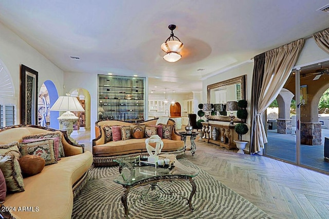 living room with parquet flooring