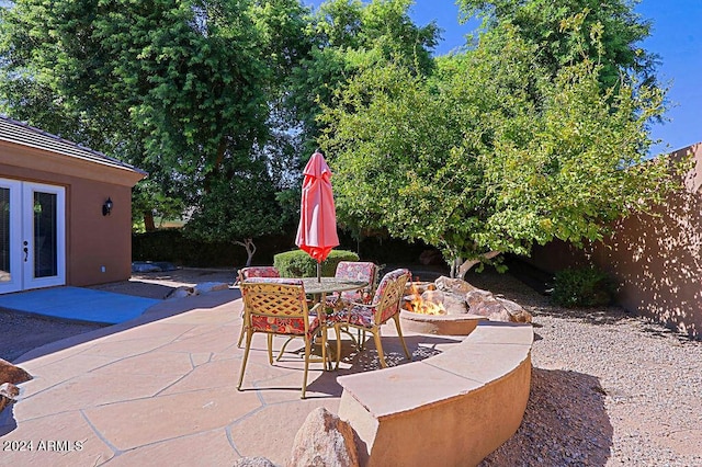 view of patio featuring french doors