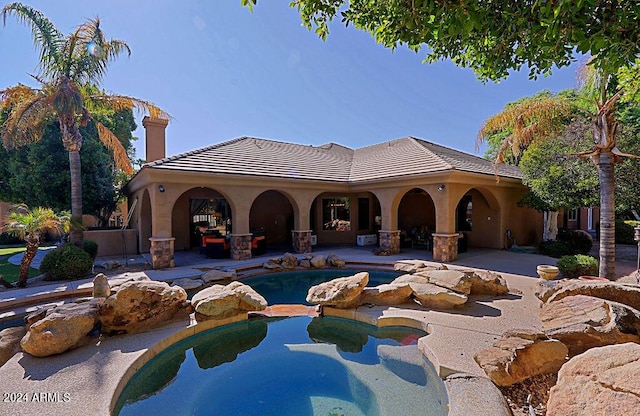 view of swimming pool featuring a patio area