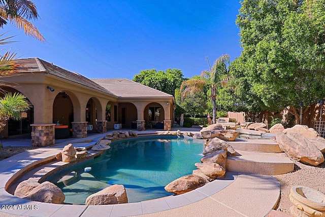 view of pool with a patio