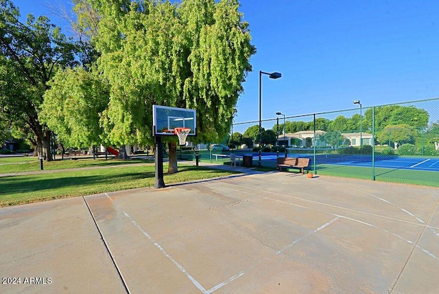 view of sport court with tennis court