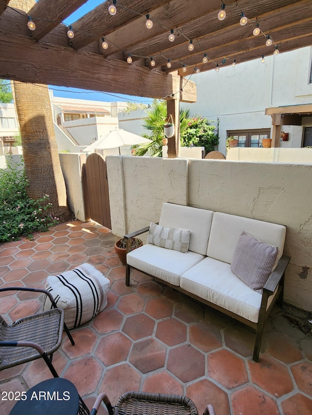 view of patio with an outdoor living space and a pergola