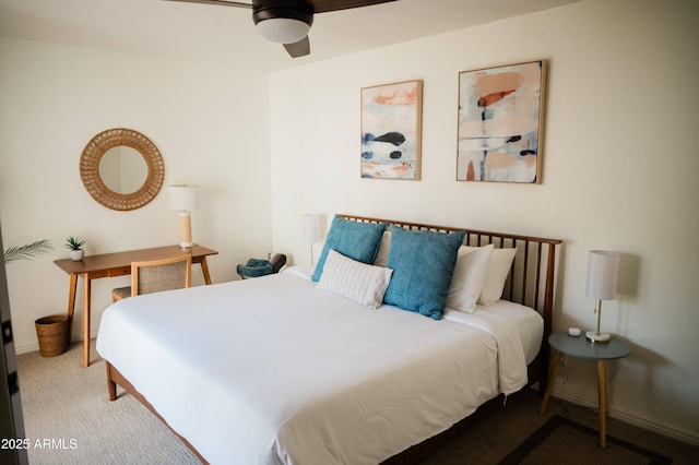 bedroom with ceiling fan and carpet