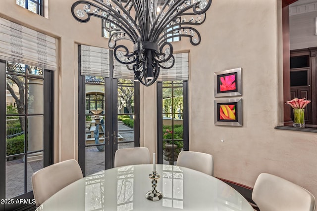 dining space with a high ceiling