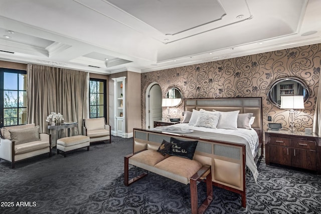 bedroom with crown molding, dark carpet, a raised ceiling, and wallpapered walls