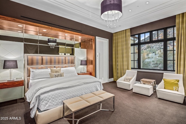 carpeted bedroom featuring crown molding and a notable chandelier