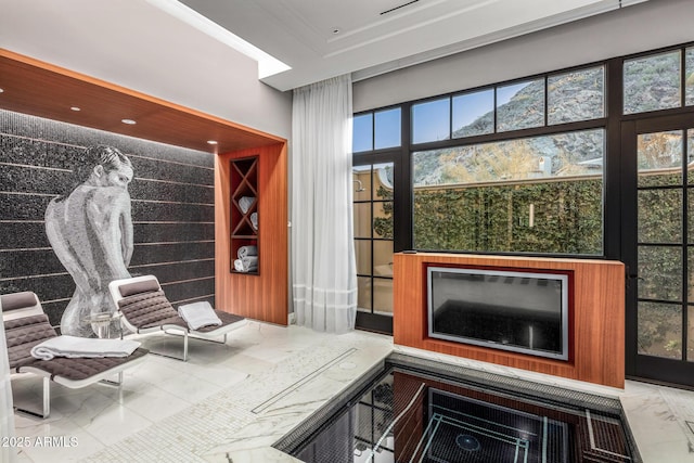 interior space featuring marble finish floor