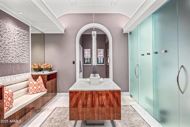 bathroom featuring lofted ceiling, marble finish floor, and vanity