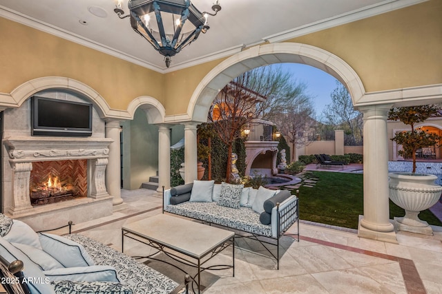 view of patio featuring an outdoor living space with a fireplace