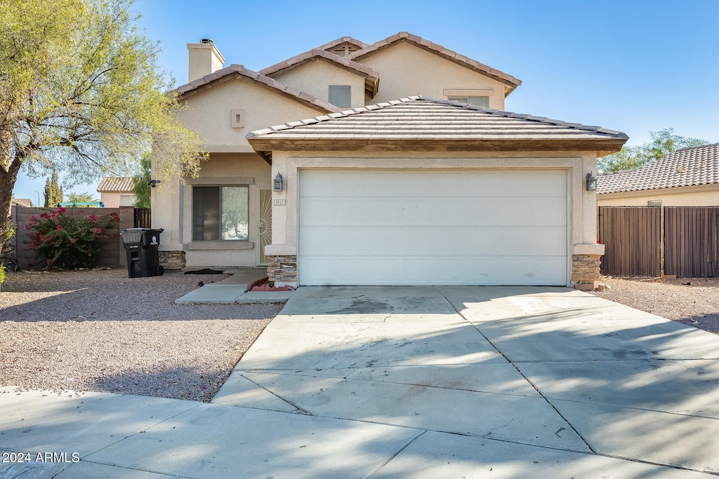 view of front of house with a garage