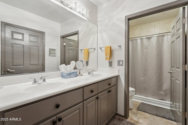 bathroom featuring toilet, curtained shower, and double vanity