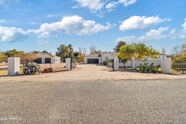 single story home featuring a garage