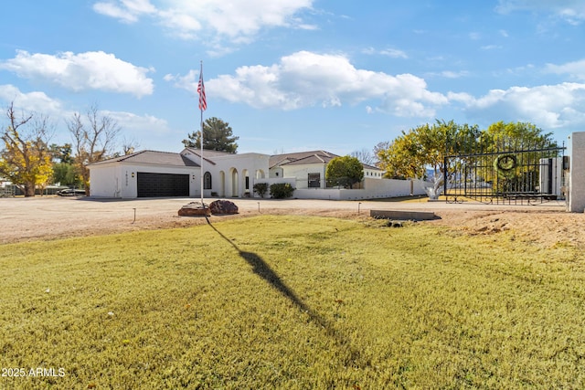 exterior space featuring a playground and a garage