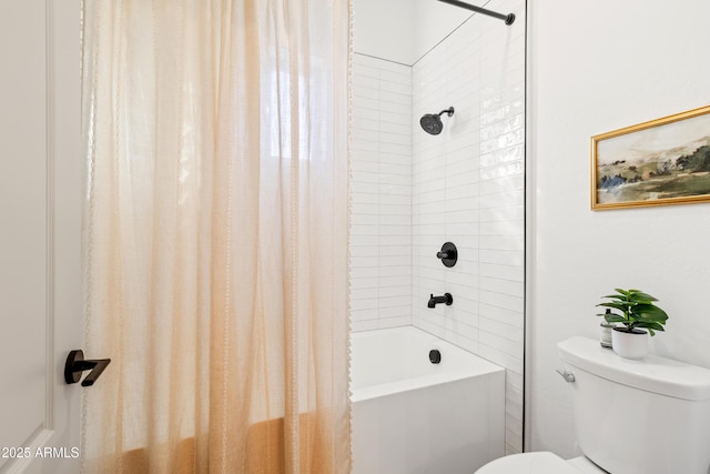 bathroom with toilet and shower / tub combo with curtain