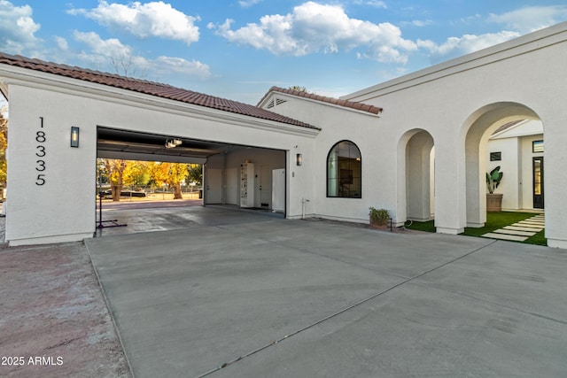 exterior space with a garage