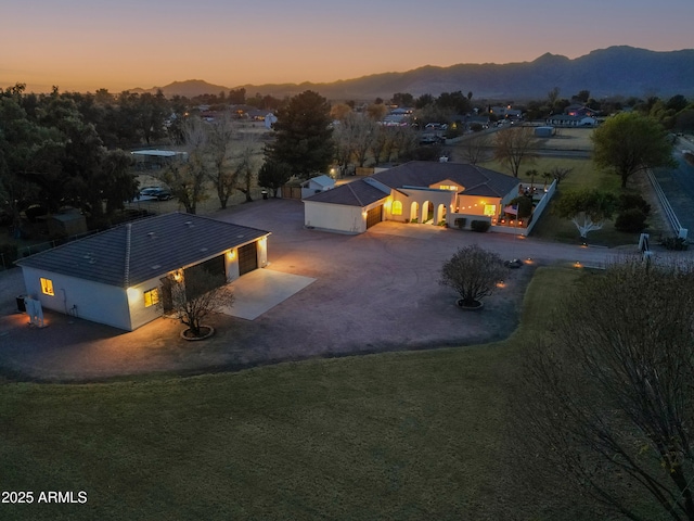 aerial view at dusk with a mountain view