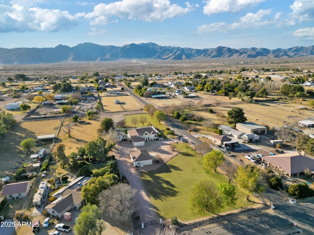 drone / aerial view featuring a mountain view