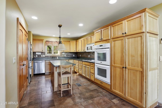 6602 W Dogwood Ln, Pine, AZ 85544 - kitchen with recessed lighting, stainless steel appliances, light brown cabinetry, and decorative backsplash