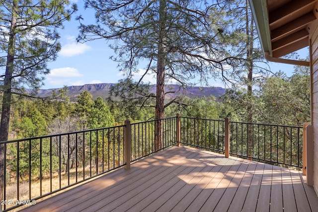 6602 W Dogwood Ln, Pine, AZ 85544 - wooden terrace featuring a wooded view and a mountain view